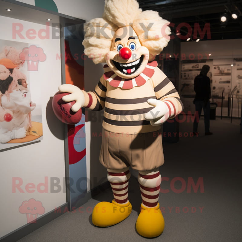 Tan Clown mascot costume character dressed with a Rugby Shirt and Foot pads