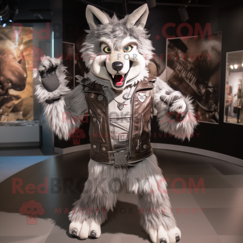 Silver Say Wolf mascot costume character dressed with a Biker Jacket and Cummerbunds Silver Say Wolf mascot costume character dressed with a Biker Jacket and Cummerbunds