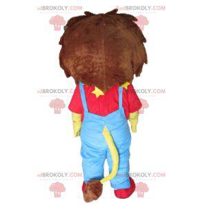 Mascot small yellow and brown lion in blue and red outfit -