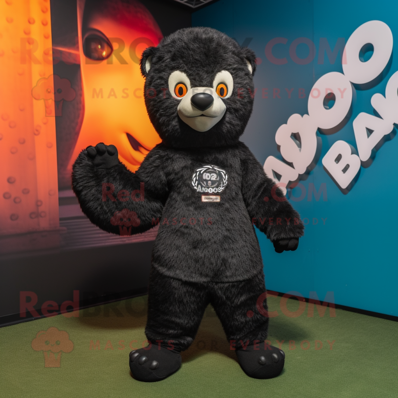 Black Mongoose mascot costume character dressed with a Graphic Tee and Shoe laces