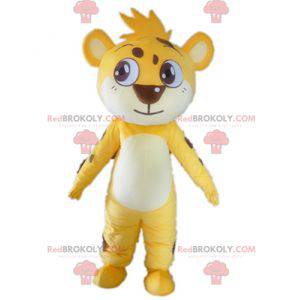 Mascote pequeno tigre amarelo branco e marrom tocando -