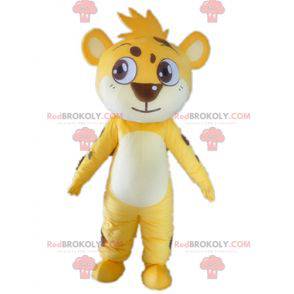 Mascote pequeno tigre amarelo branco e marrom tocando -