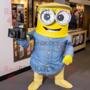 Yellow Camera mascot costume character dressed with a Chambray Shirt and Earrings