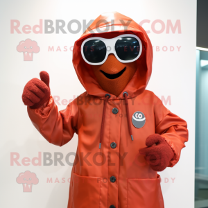Rust Raspberry mascot costume character dressed with a Raincoat and Sunglasses