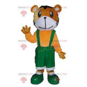 Mascotte de tigre orange et blanc en salopette verte -