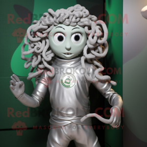 Silver Medusa mascot costume character dressed with a T-Shirt and Lapel pins