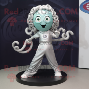 Silver Medusa mascot costume character dressed with a T-Shirt and Lapel pins