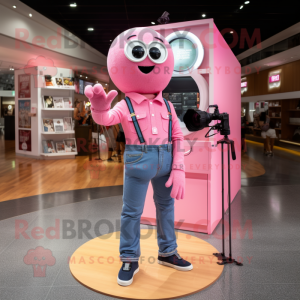 Pink Camera mascot costume character dressed with a Flare Jeans and Watches