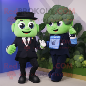 Blue Broccoli mascot costume character dressed with a Tuxedo and Smartwatches