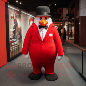 Red Penguin mascot costume character dressed with a Suit Jacket and Berets