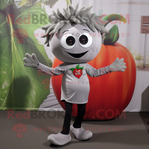 Silver Tomato mascot costume character dressed with a V-Neck Tee and Hair clips