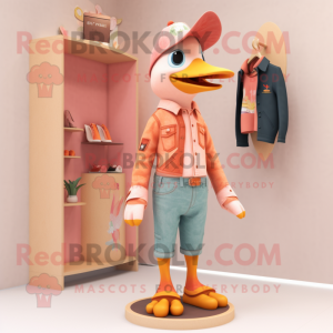 Peach Woodpecker mascot costume character dressed with a Bootcut Jeans and Earrings