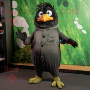 Olive Blackbird mascot costume character dressed with a Jeggings and Gloves