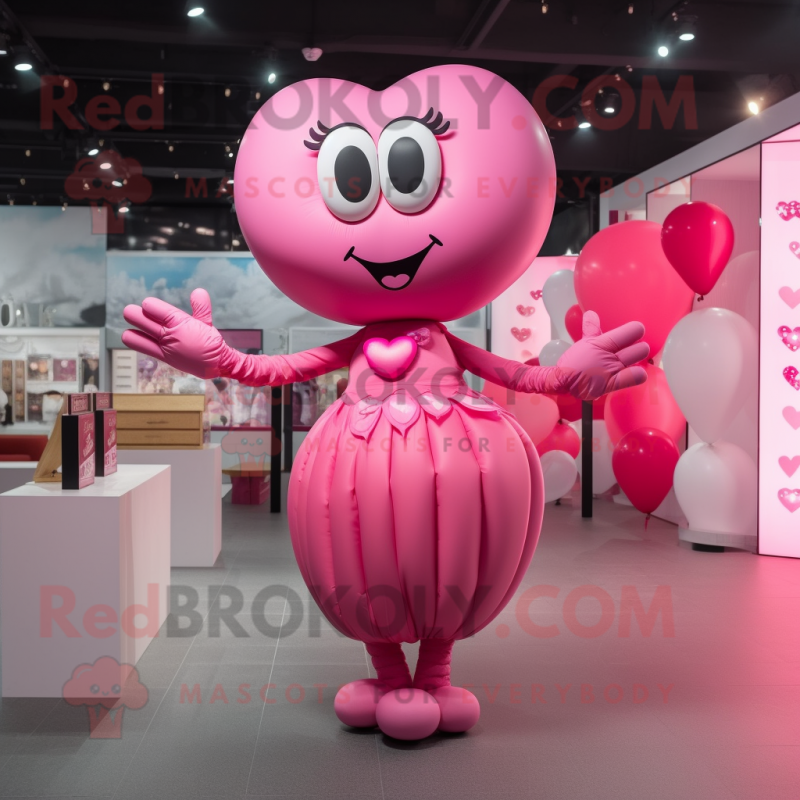 Pink Heart Shaped Balloons mascot costume character dressed with a Maxi Dress and Bracelets Pink Heart Shaped Balloons mascot costume character dressed with a Maxi Dress and Bracelets
