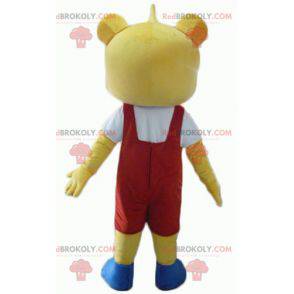 Gelbes Teddybärmaskottchen im roten und weißen Outfit -