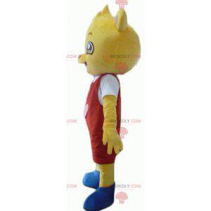Żółty miś maskotka w czerwono-białym stroju - Redbrokoly.com