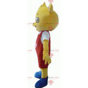 Mascote do ursinho de pelúcia amarelo com roupa vermelha e