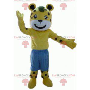 Mascota tigre amarillo y blanco con lunares marrones con