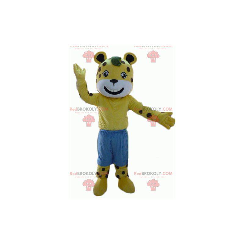 Mascote tigre amarelo e branco com bolinhas marrons e shorts -
