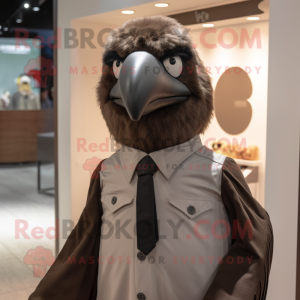 Brown Crow mascot costume character dressed with a Poplin Shirt and Tie pins