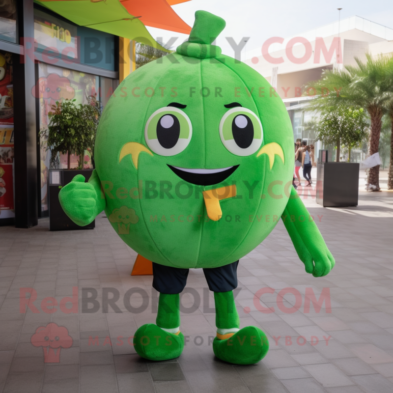 Green Grapefruit mascot costume character dressed with a Jeggings and Keychains