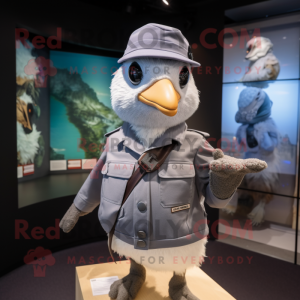 Gray Quail mascot costume character dressed with a Windbreaker and Berets