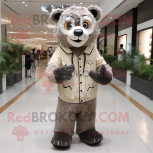 Beige Spectacled Bear mascot costume character dressed with a Jeggings and Watches