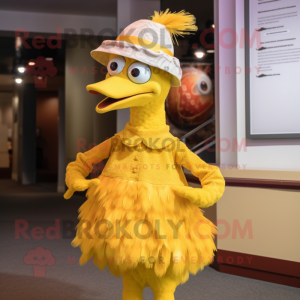 Yellow Ostrich mascot costume character dressed with a Pleated Skirt and Caps