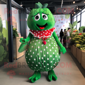 Green Strawberry mascot costume character dressed with a Maxi Dress and Lapel pins