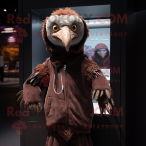 Brown Vulture mascot costume character dressed with a Hoodie and Keychains