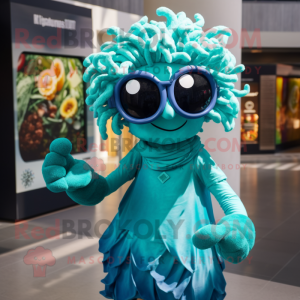 Turquoise Medusa mascot costume character dressed with a Poplin Shirt and Sunglasses