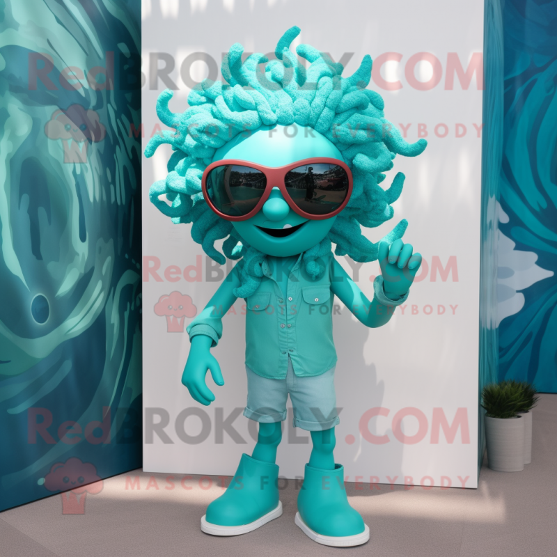 Turquoise Medusa mascot costume character dressed with a Poplin Shirt and Sunglasses Turquoise Medusa mascot costume character dressed with a Poplin Shirt and Sunglasses