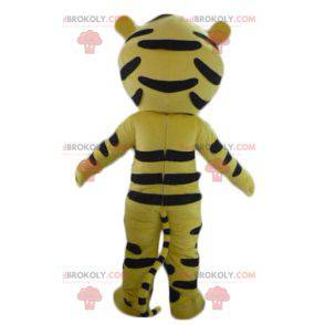 Menino mascote vestido com fantasia de tigre amarelo -
