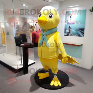 Lemon Yellow Pigeon mascot costume character dressed with a Capri Pants and Wallets
