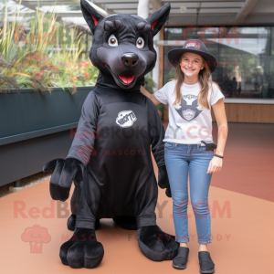 Black Dingo mascot costume character dressed with a Mom Jeans and Hats