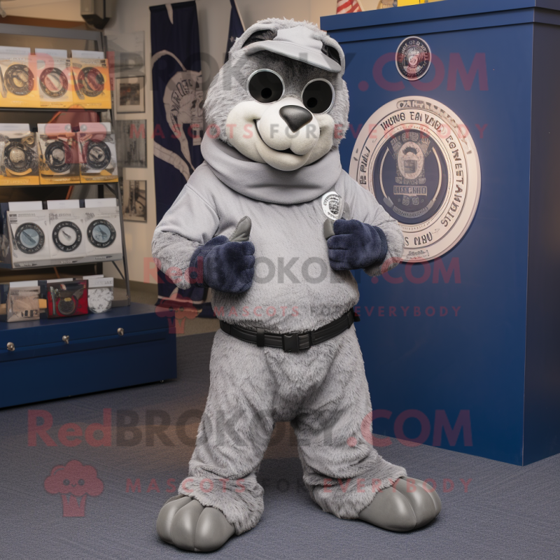 Silver Navy Seal mascot costume character dressed with a Joggers and Rings