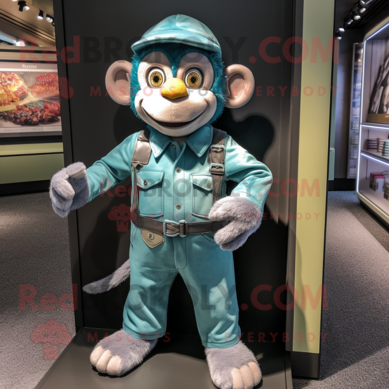 Teal Monkey mascot costume character dressed with a Dungarees and Suspenders