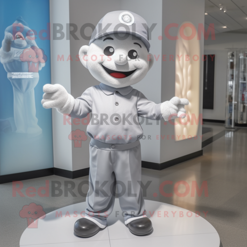 Silver Candy mascot costume character dressed with a Polo Shirt and Hats