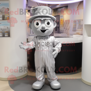 Silver Candy mascot costume character dressed with a Polo Shirt and Hats
