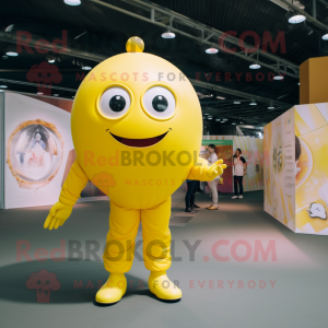 Lemon Yellow Human Cannon Ball mascot costume character dressed with a Jumpsuit and Brooches