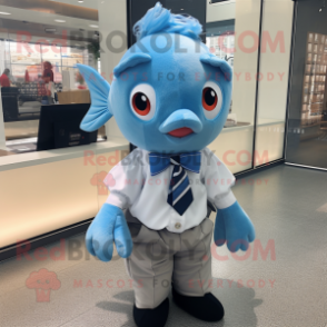 Sky Blue Goldfish mascot costume character dressed with a Oxford Shirt and Bow ties