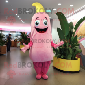 Pink Banana mascot costume character dressed with a A-Line Skirt and Brooches