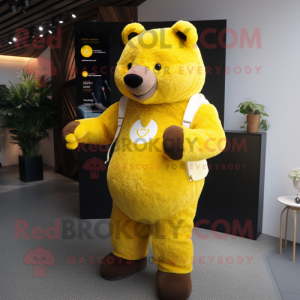 Yellow Bear mascot costume character dressed with a Cardigan and Smartwatches