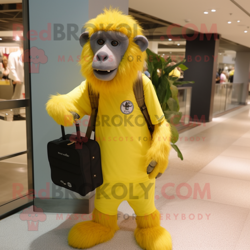 Lemon Yellow Baboon mascot costume character dressed with a T-Shirt and Messenger bags