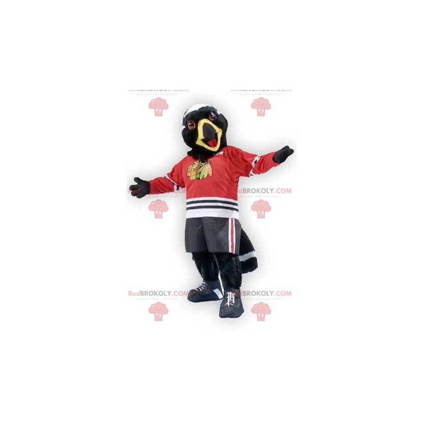 Black and white bird eagle mascot in sportswear - Redbrokoly.com