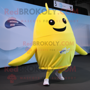 Lemon Yellow Narwhal mascot costume character dressed with a Running Shorts and Cummerbunds