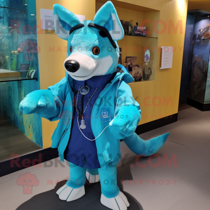 Cyan Dingo mascot costume character dressed with a Coat and Keychains