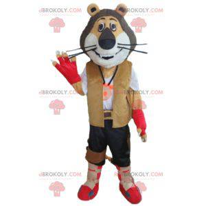 Mascota del león tricolor en traje de explorador motorista -