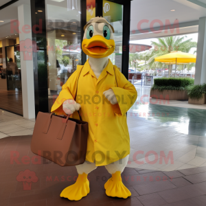 Lemon Yellow Duck mascot costume character dressed with a Dress Shirt and Tote bags