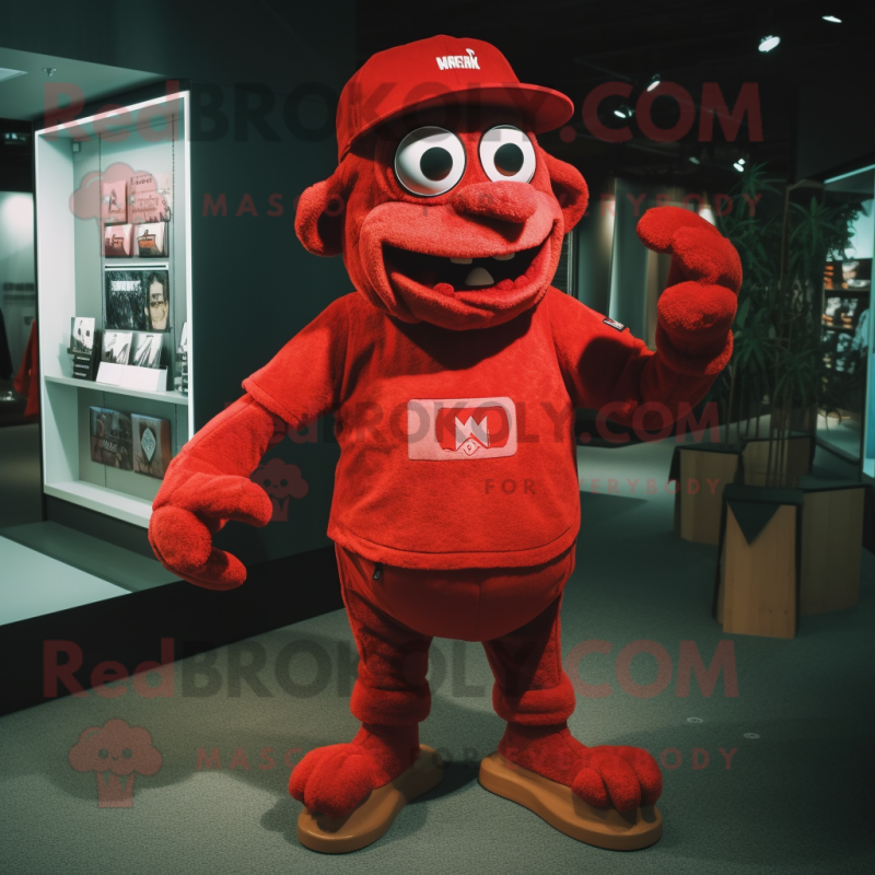 Red Frankenstein mascot costume character dressed with a T-Shirt and Caps Red Frankenstein mascot costume character dressed with a T-Shirt and Caps